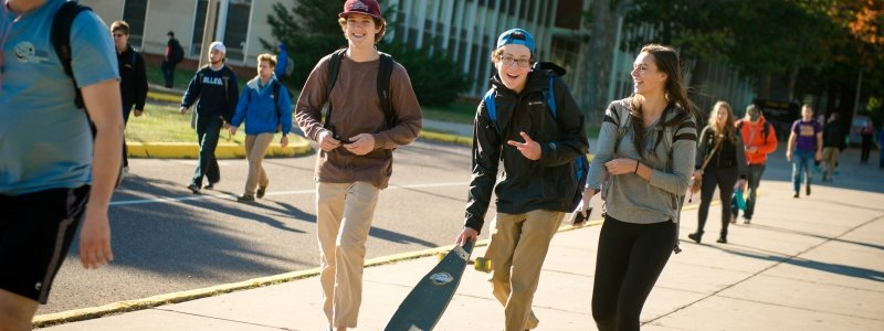 Students walking on campus.