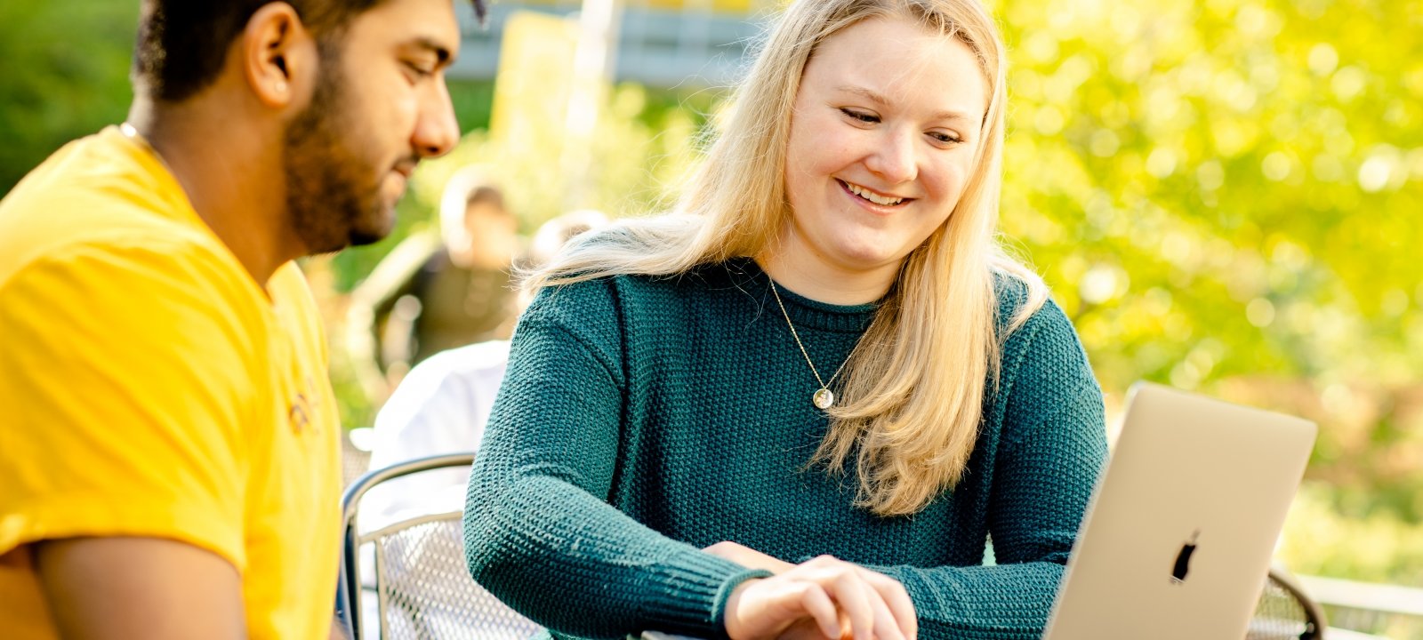 Students sitting outside