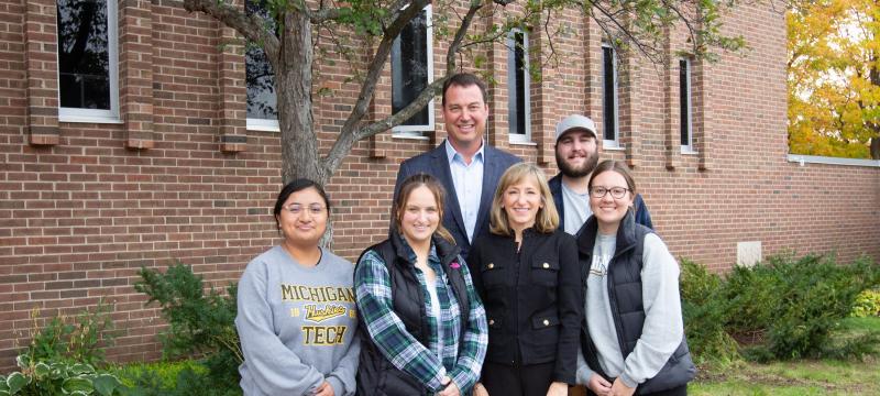 Elizabeth and Mike Pulick with members of Blue Key