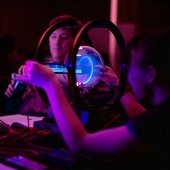 Students working in a dark lab.