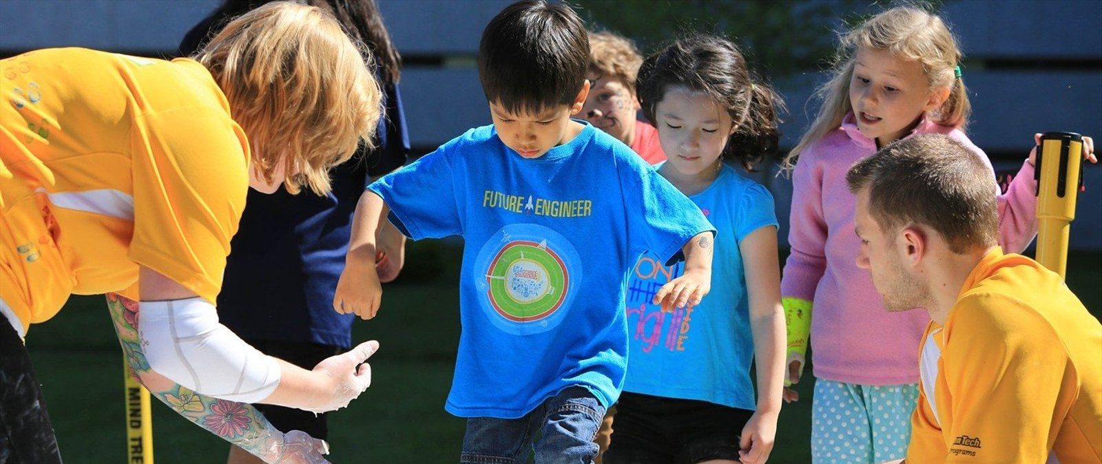 Mind Trekkers showing a young boy how to cross oobleck.