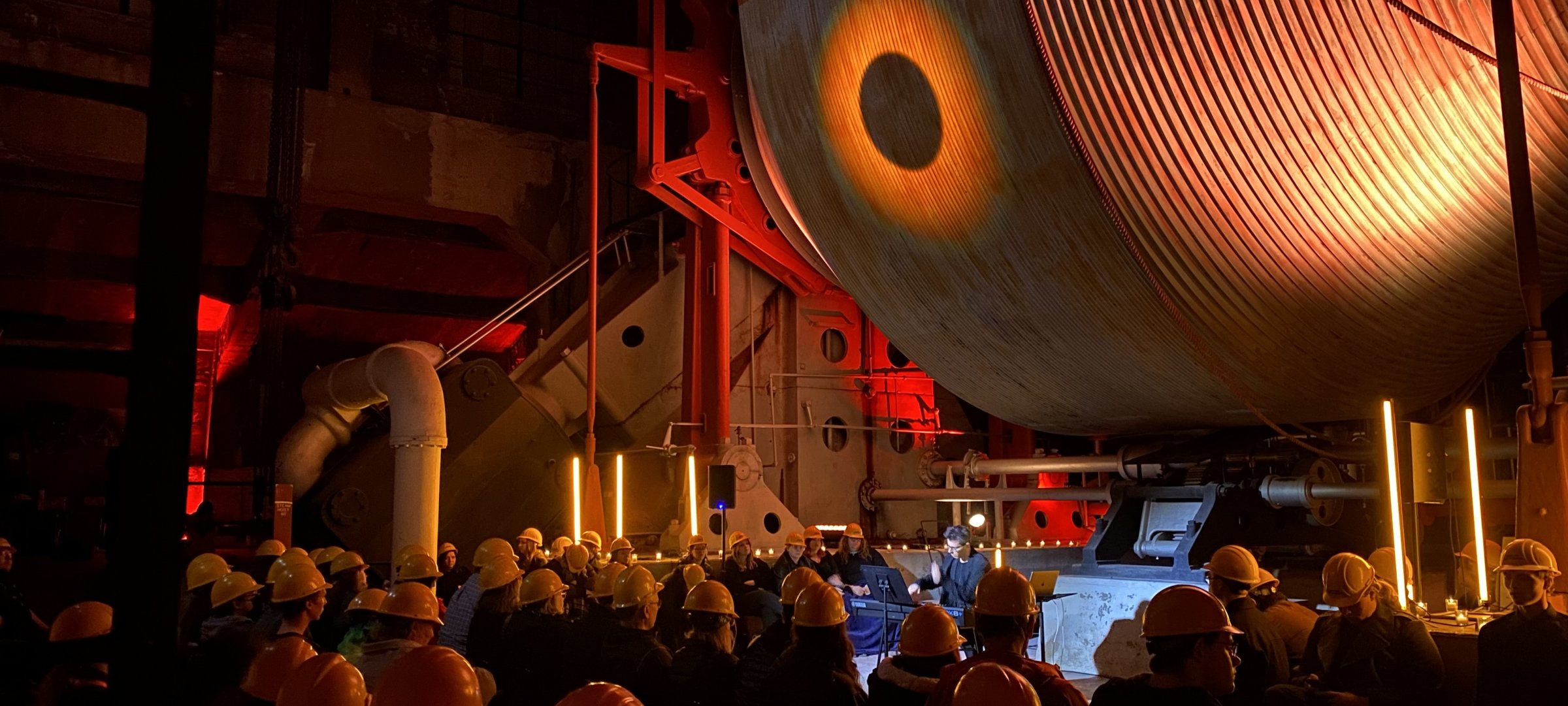 Audience listening to a performance in the Quincy Mine Hoist House